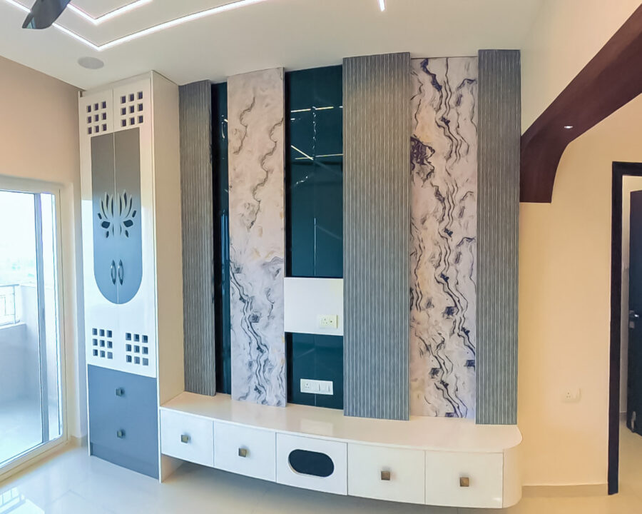 TV Unit & Marble Feature Wall by CRSTEL INTERIORS