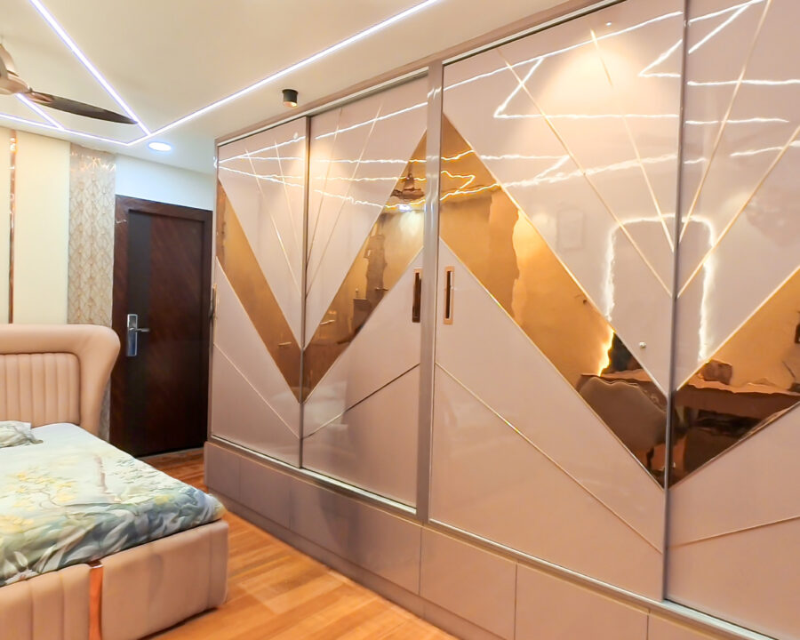 Bedroom Wardrobe with Mirror Panel Design by CRSTEL INTERIORS