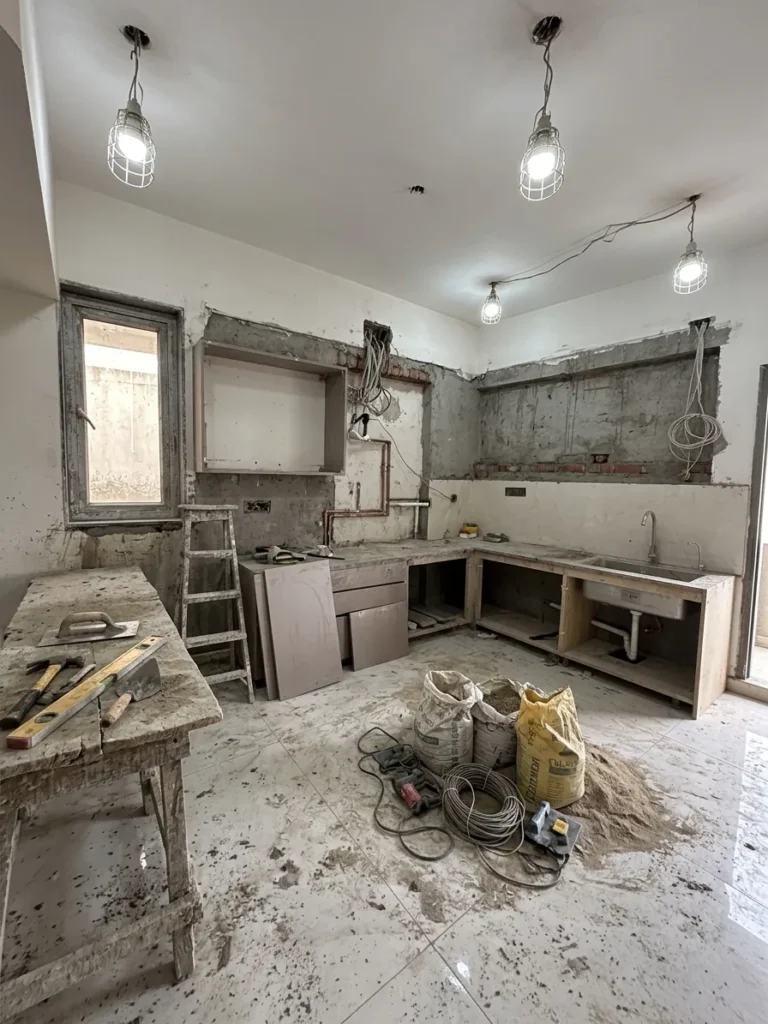 Kitchen stripped back during renovation, before the modular units