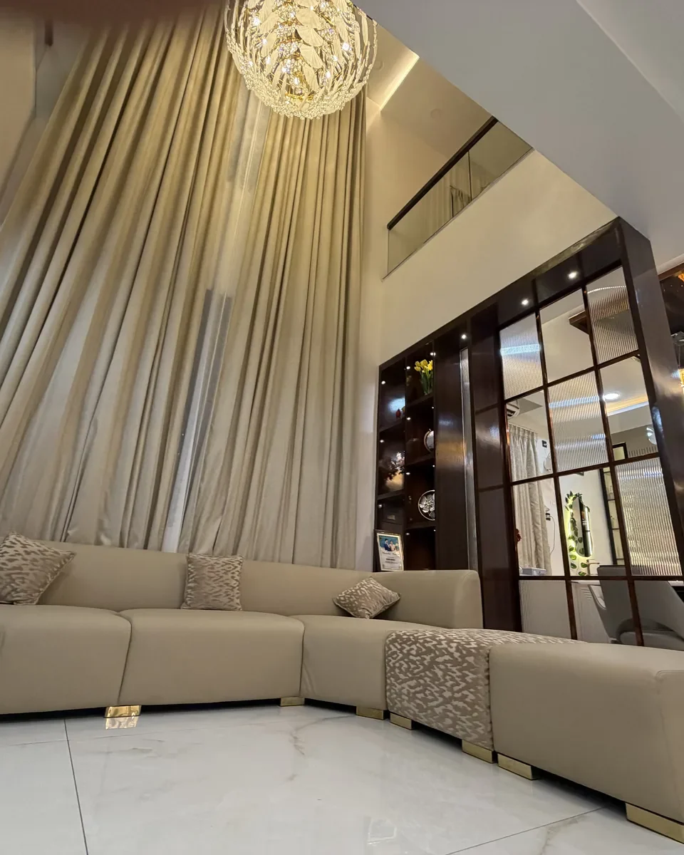 Double-Height Living Room with Drapes